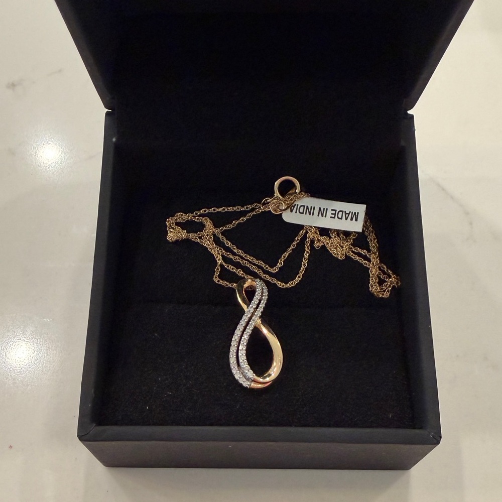 Zales 1/8 CT Diamond Double Row Infinity Pendant Necklace in 10K Gold